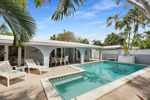 view of pool featuring a patio area, a fenced in pool, and fence