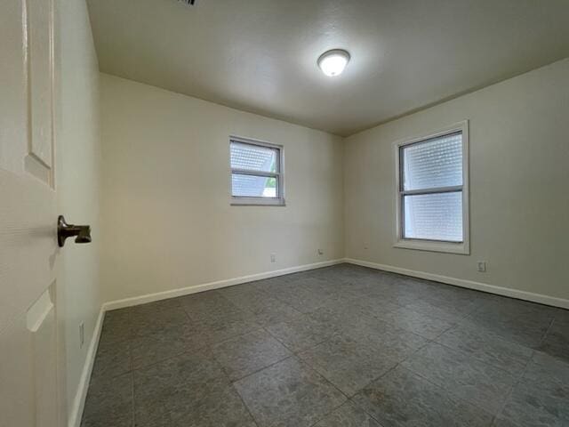 1608 Venetian Dr, Key West, FL 33040 - empty room featuring baseboards