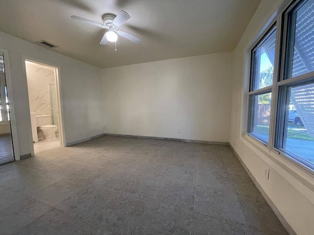 1608 Venetian Dr, Key West, FL 33040 - spare room with a ceiling fan and baseboards