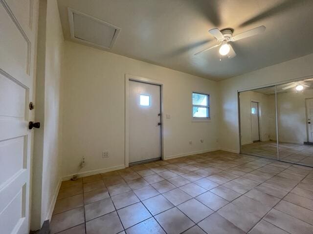 1608 Venetian Dr, Key West, FL 33040 - foyer with ceiling fan and light tile patterned flooring