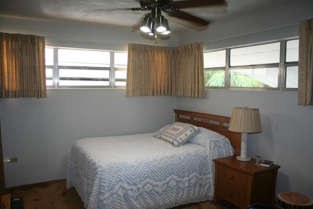 bedroom featuring ceiling fan