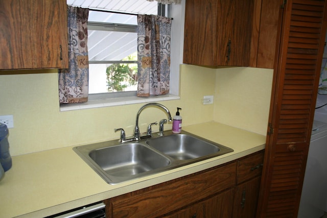 kitchen featuring sink and dishwasher