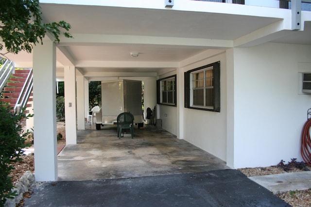 view of patio / terrace with a carport