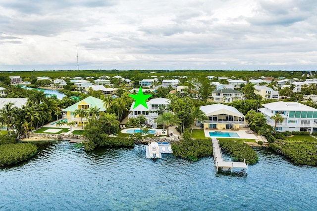 bird's eye view with a water view