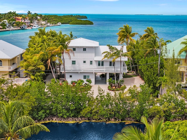 birds eye view of property featuring a water view