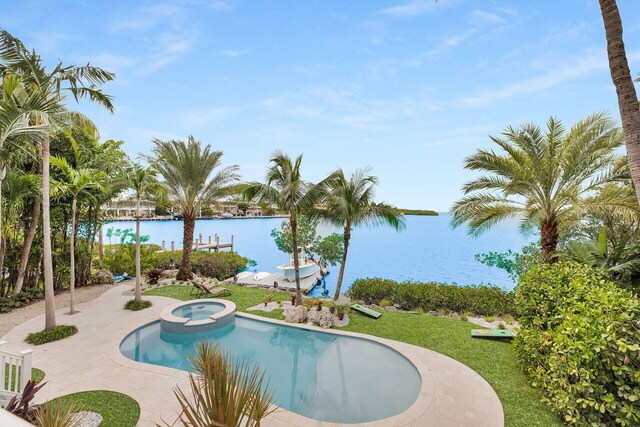 wooden deck with a water view