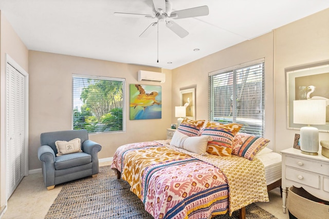 bedroom featuring multiple windows, a wall unit AC, and ceiling fan