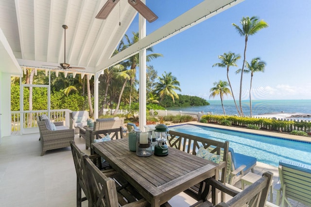 view of patio / terrace featuring a water view, an outdoor hangout area, and ceiling fan