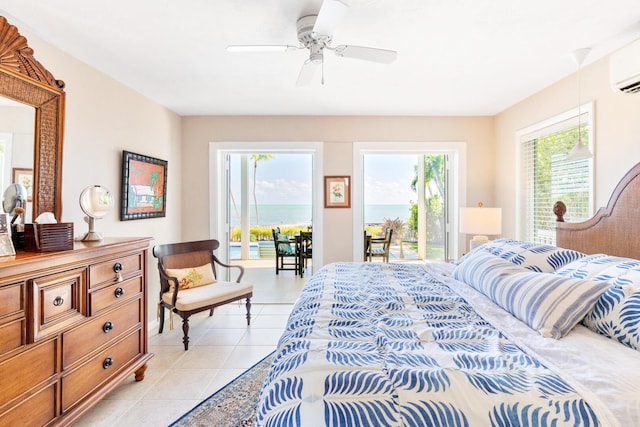 tiled bedroom with an AC wall unit, access to exterior, and ceiling fan