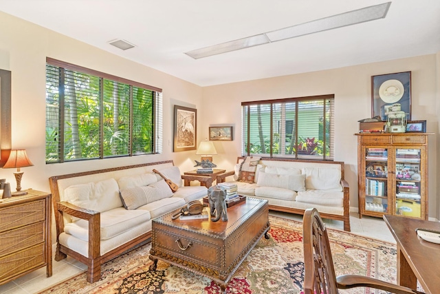 living room with light tile patterned floors