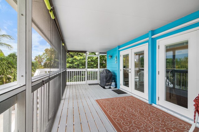 deck featuring grilling area and french doors