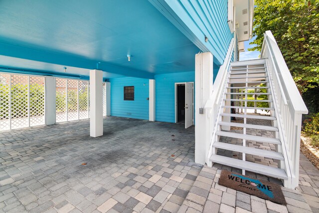 view of patio featuring a carport