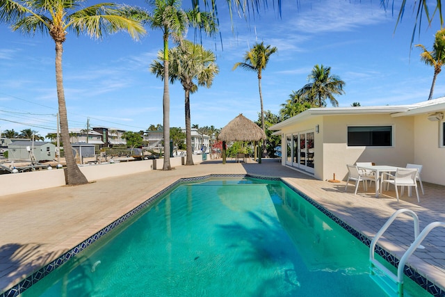 view of swimming pool featuring a gazebo and a patio area