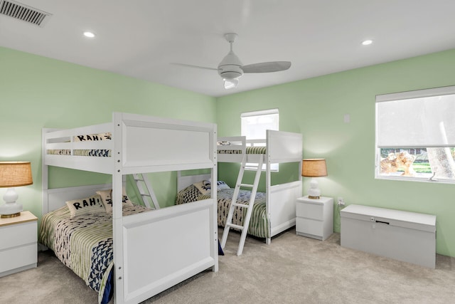 carpeted bedroom featuring ceiling fan