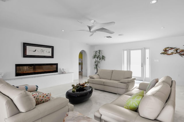 living room with ceiling fan