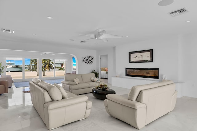 living room with ceiling fan