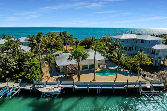 birds eye view of property featuring a water view