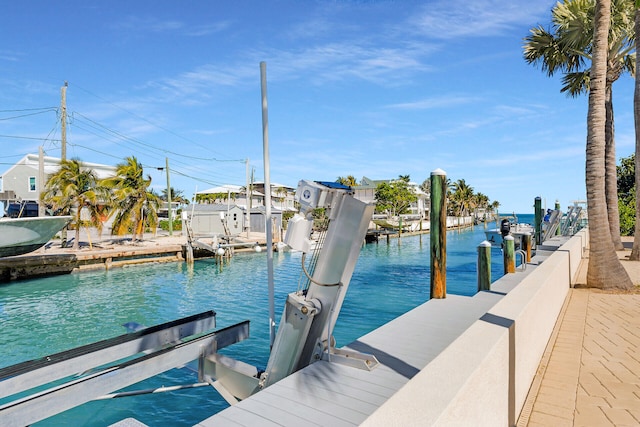 view of dock with a water view