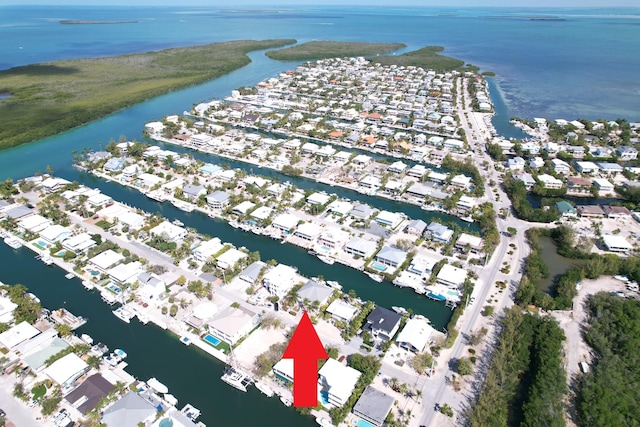 aerial view with a water view and a residential view