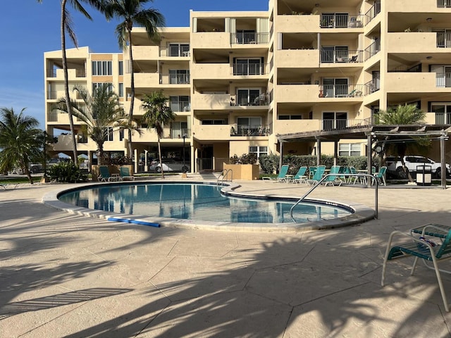 view of pool featuring a patio