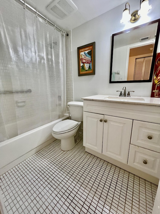 full bathroom with vanity, shower / tub combo, tile patterned floors, and toilet