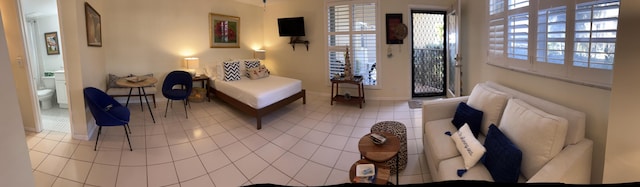 sitting room with tile patterned floors