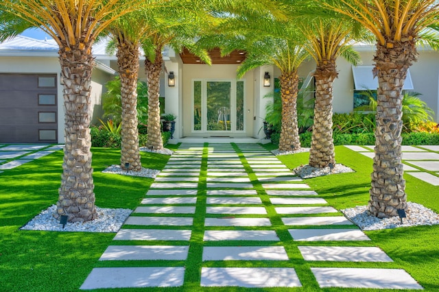 view of yard featuring an attached garage