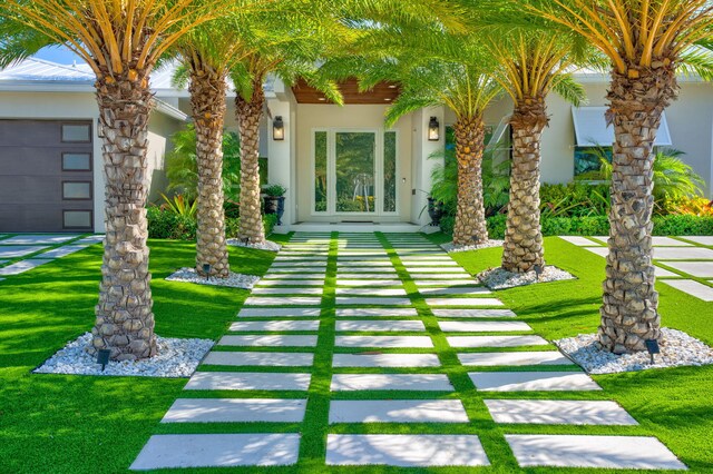 pool featuring a grill, fence, a yard, ceiling fan, and a patio area