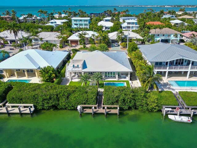 180 13th St, Key Colony, FL 33051 - aerial view of residential area featuring a pool area and a nearby body of water