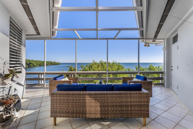 view of patio / terrace featuring a water view and outdoor lounge area