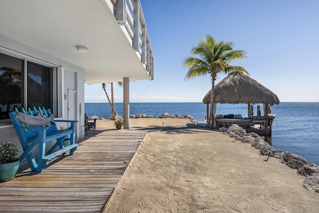 dock area featuring a water view and a gazebo