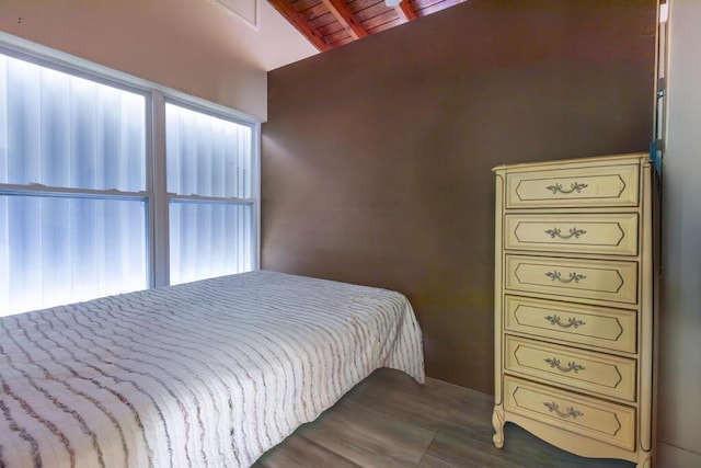 bedroom featuring lofted ceiling