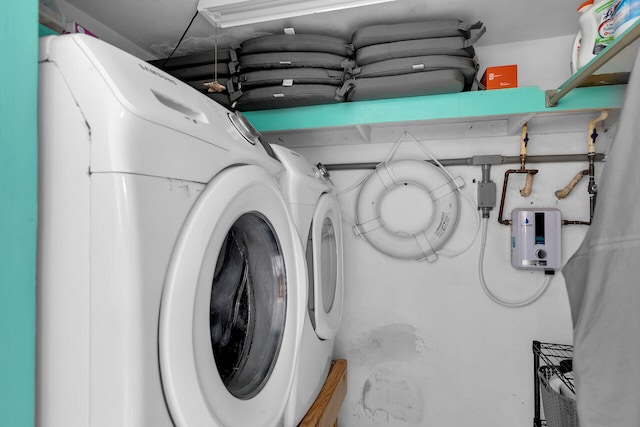 washroom featuring independent washer and dryer