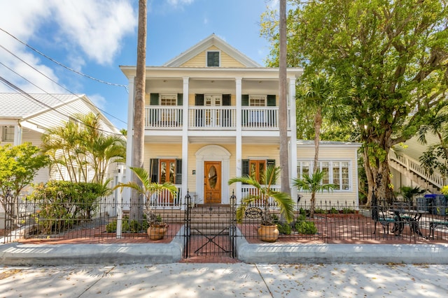 neoclassical / greek revival house with a balcony