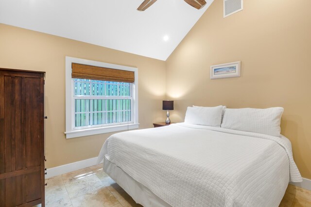 bedroom featuring high vaulted ceiling and ceiling fan