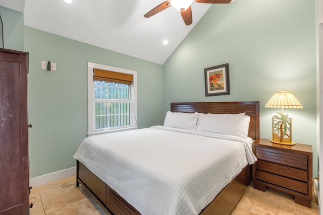 bedroom featuring ceiling fan and vaulted ceiling