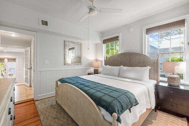 bedroom featuring ceiling fan and light wood-type flooring