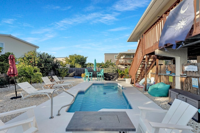 view of pool featuring a patio