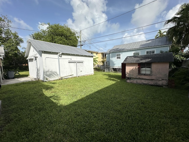 view of yard with a storage unit