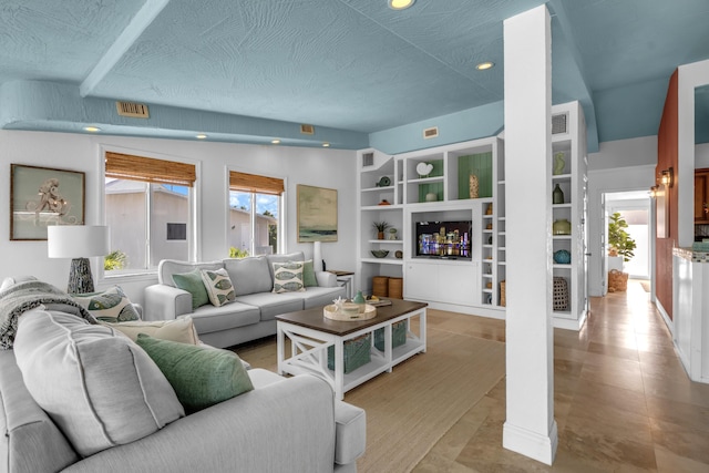 living room featuring a textured ceiling