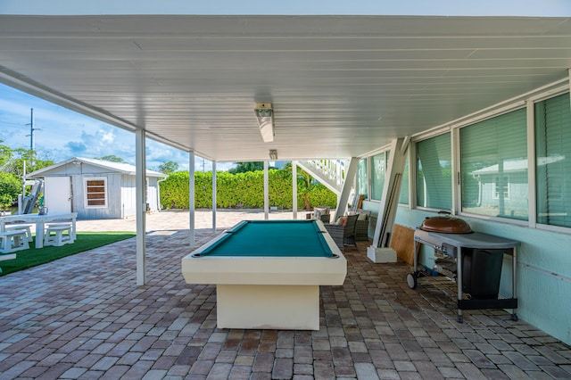 view of patio / terrace featuring an outbuilding