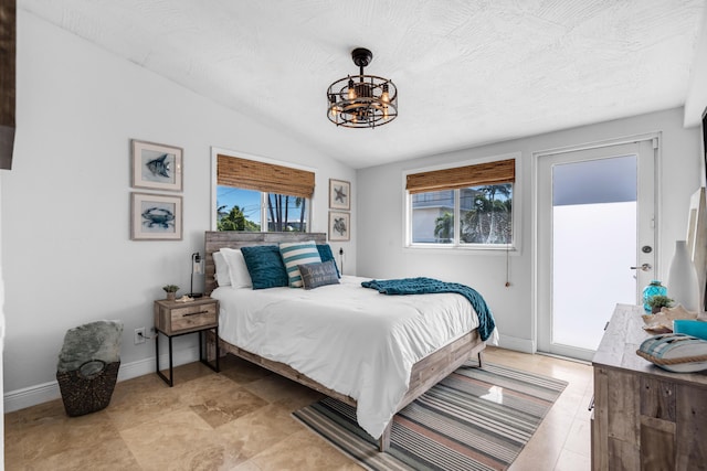 bedroom with lofted ceiling, access to exterior, a chandelier, and a textured ceiling