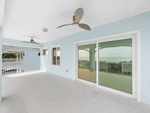 view of patio / terrace featuring ceiling fan