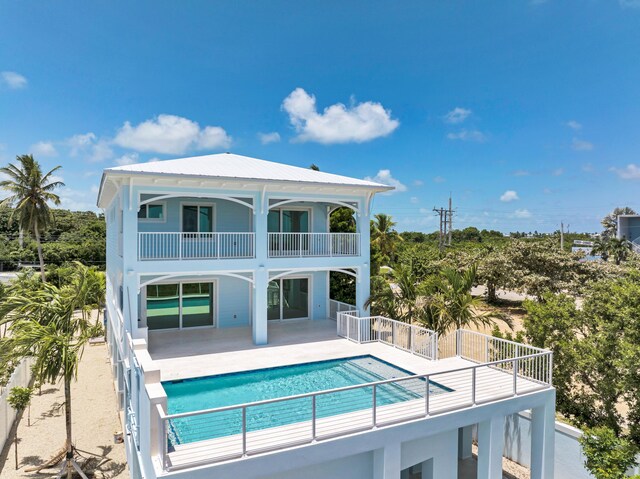 rear view of house with a patio