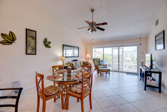 306 N Anglers Dr Unit B, Marathon, FL 33050 - dining room with vaulted ceiling, light tile patterned floors, a ceiling fan, and a textured ceiling