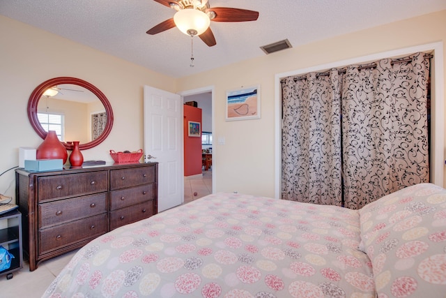 306 N Anglers Dr Unit B, Marathon, FL 33050 - bedroom with tile patterned floors and a ceiling fan
