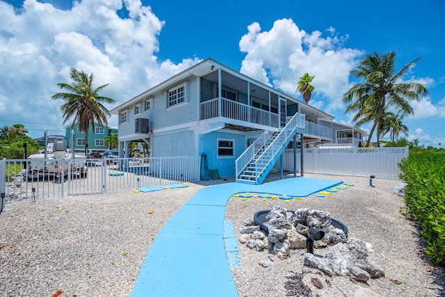 306 N Anglers Dr Unit B, Marathon, FL 33050 - view of property with a fire pit and stairs