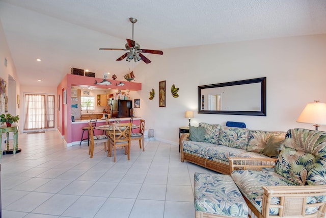 306 N Anglers Dr Unit B, Marathon, FL 33050 - living room with light tile patterned floors, a ceiling fan, lofted ceiling, and recessed lighting