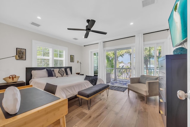 bedroom featuring ceiling fan, ornamental molding, access to exterior, and light hardwood / wood-style flooring