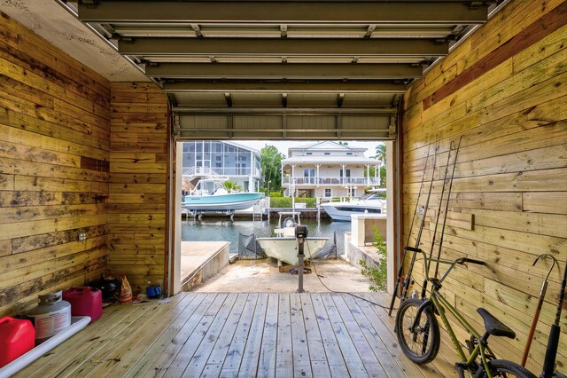 interior space featuring a boat dock and a water view